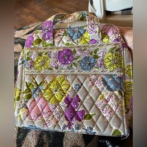 This is a Vera Bradley small travel bag perfect condition